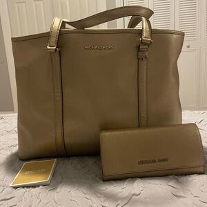 Michael Kors bag including it’s own handheld purse.